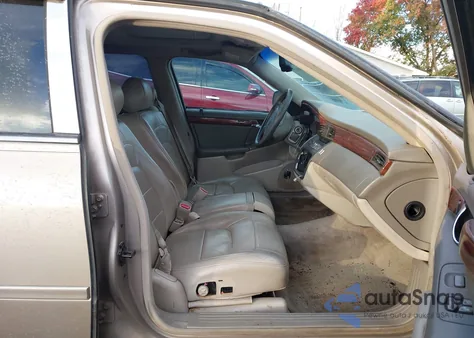 2004 Cadillac Deville Standard z USA, uszkodzony, nr VIN 1G6KD54Y44U146543